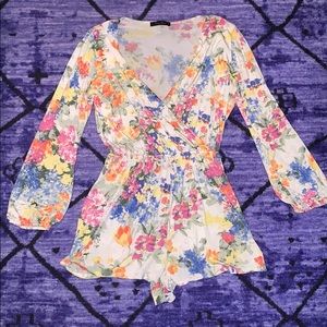 Floral Shorts romper with plunging cross front